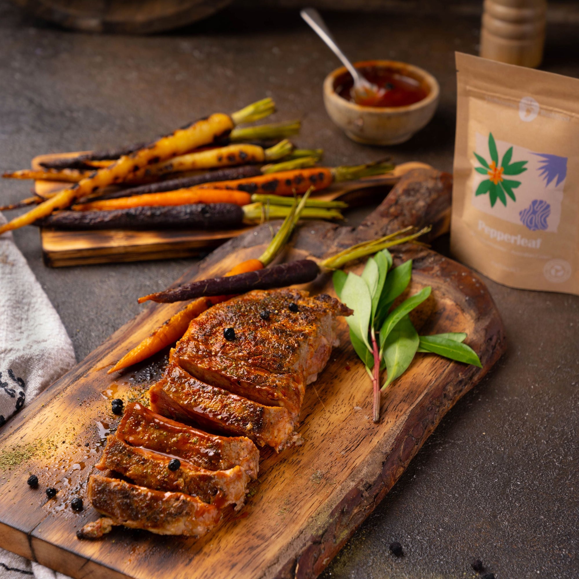 Rib Eye Steak with grilled carrots and Mountain Pepperleaf
